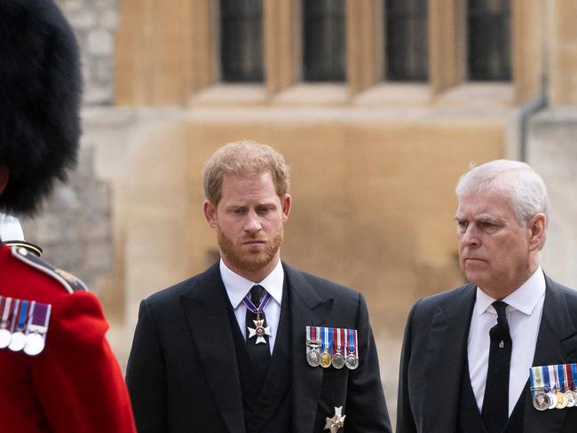 Prince Harry with Prince Andrew, Duke of York. Picture: AFP