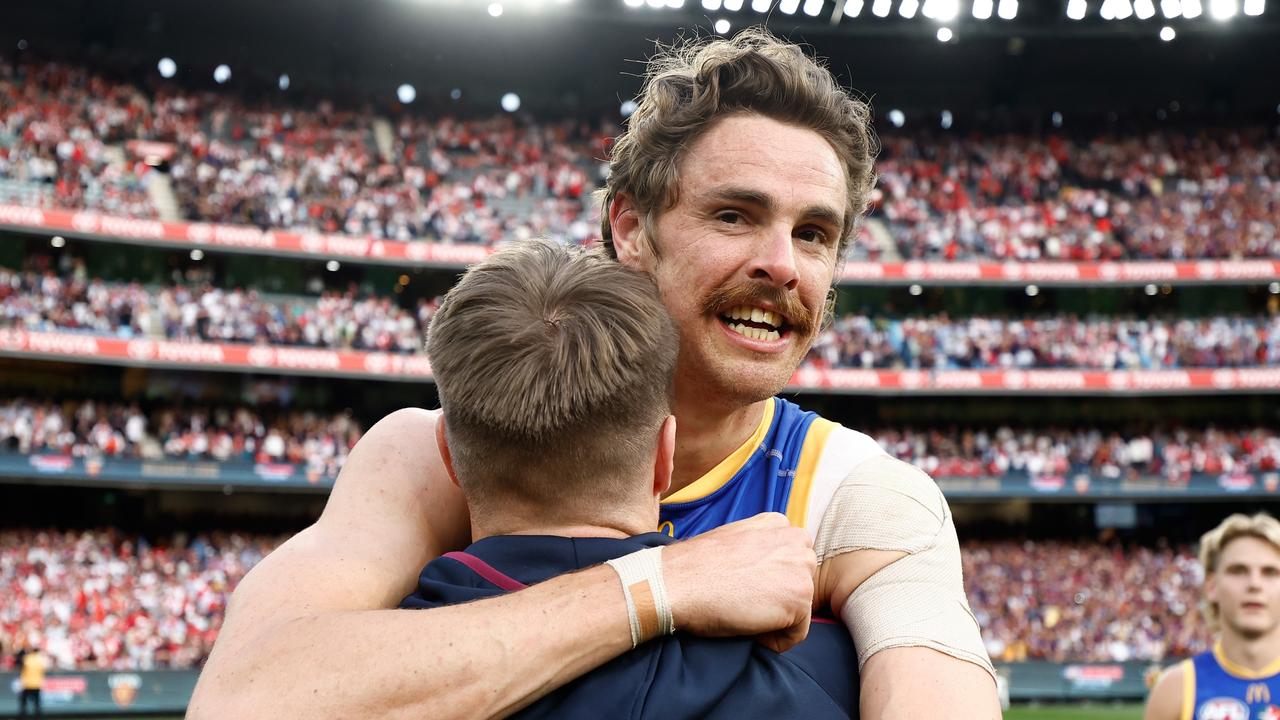 MELBOURNE, AUSTRALIA - SEPTEMBER 28: Lincoln McCarthy (left) and Joe Daniher of the Lions celebrate during the 2024 AFL Grand Final match between the Sydney Swans and the Brisbane Lions at The Melbourne Cricket Ground on September 28, 2024 in Melbourne, Australia. (Photo by Michael Willson/AFL Photos via Getty Images)