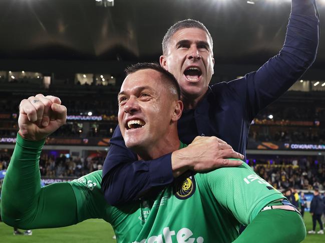 SYDNEY, AUSTRALIA - JUNE 03:  Mariners Head Coach Nick Montgomery (R) embraces Daniel Vukovic as they celebrate winning the 2023 A-League Men's Grand Final match between Melbourne City and Central Coast Mariners at CommBank Stadium, on June 03, 2023, in Sydney, Australia. (Photo by Matt King/Getty Images)