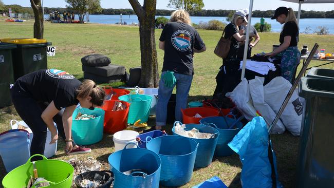 Volunteers with buckets of plastic and waste collected from the Adelaide Dolphin Sanctuary in November and December 2018. Pictures: Supplied