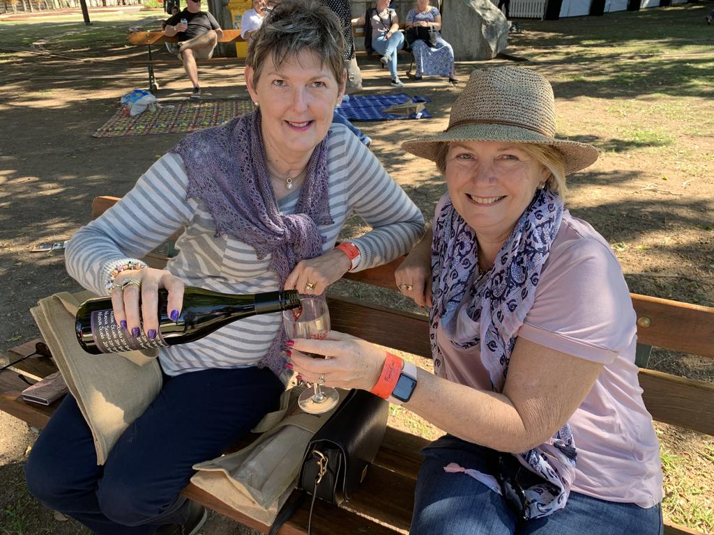 Sisters in law Rhonda and Joanne Gilchrist enjoy a bottle of wine together at Relish Food and Wine Festival in Maryborough. Photo: Stuart Fast