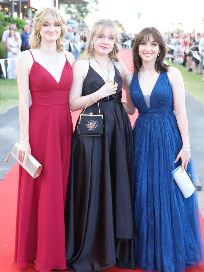 Emily Scanlan, Mirage Hunter-Demecs, Joely Adamik at the James Nash State High School formal 2022.