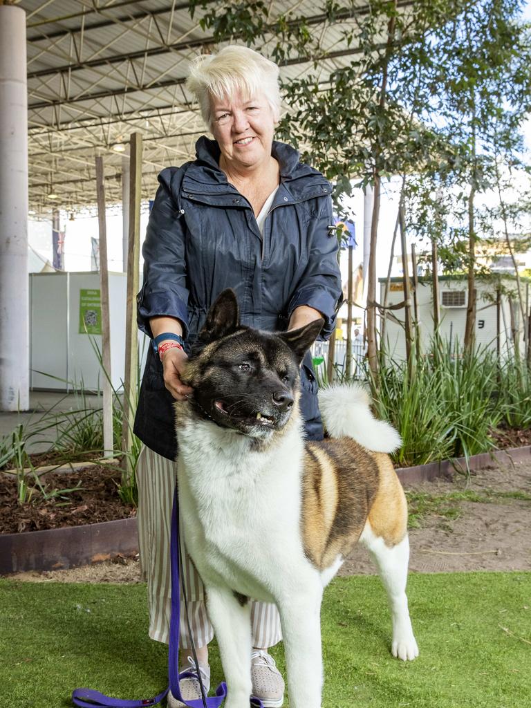 Julia Jones with Chance the American Akita at the Ekka at the RNA Showgrounds in Bowen Hills on Thursday. Picture: Richard Walker