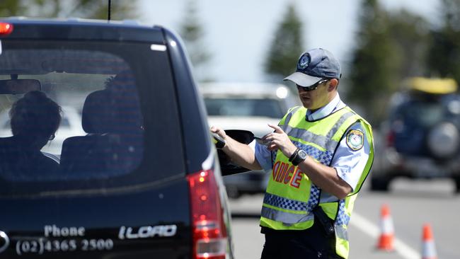 Members of Central Coast Highway Patrol conduct RBT on drivers, in the lead up to Christmas.