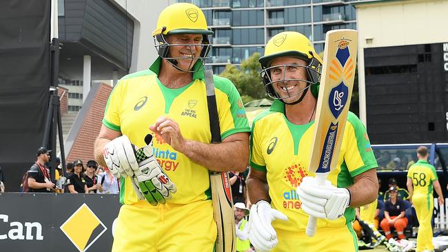 Matthew Hayden and Justin Langer walk out to bat during the Bushfire Cricket Bash T20 match between the Ponting XI and the Gilchrist XI at Junction Oval last year.