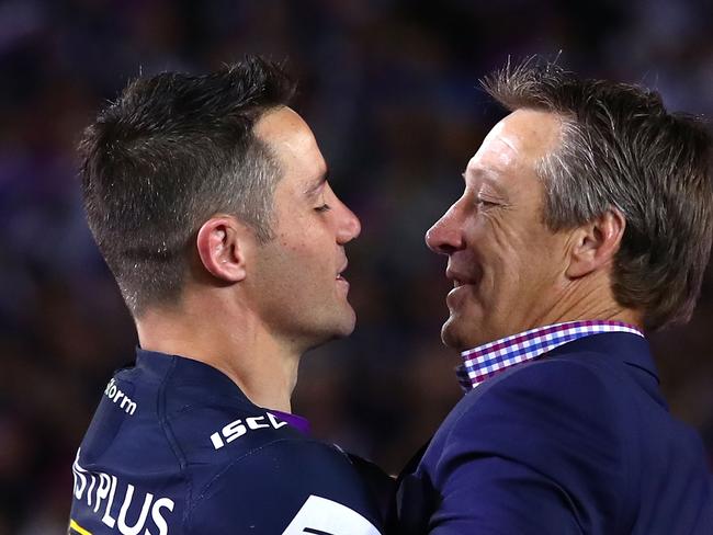 SYDNEY, AUSTRALIA - OCTOBER 01:  Cooper Cronk of the Storm celebrates with coach Craig Bellamy after winning the 2017 NRL Grand Final match between the Melbourne Storm and the North Queensland Cowboys at ANZ Stadium on October 1, 2017 in Sydney, Australia.  (Photo by Mark Kolbe/Getty Images)