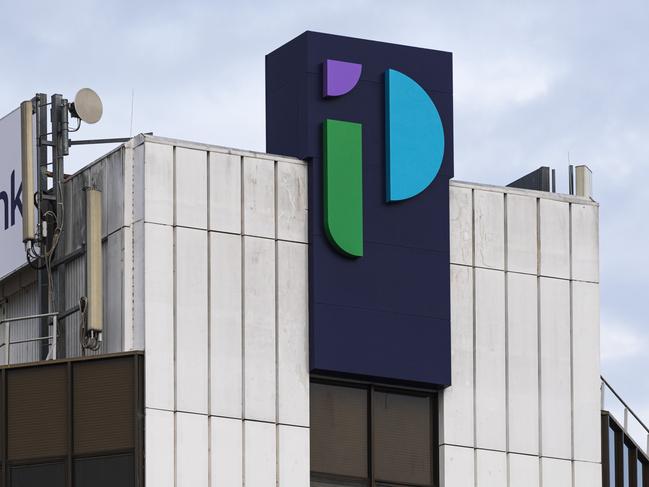 Heritage Bank head office building in Ruthven St now displays the merged rebranded name of People First Bank, Friday, June 21, 2024. Picture: Kevin Farmer