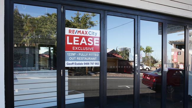 “For Lease” signs on restaurant facades on Given Terrace in Paddington, Brisbane. Picture: AAP/Claudia Baxter