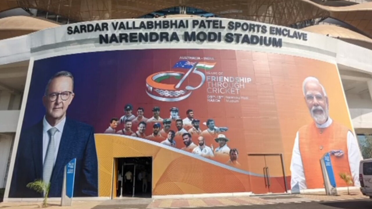 A giant billboard is set up to welcome Albanese to the cricket in India