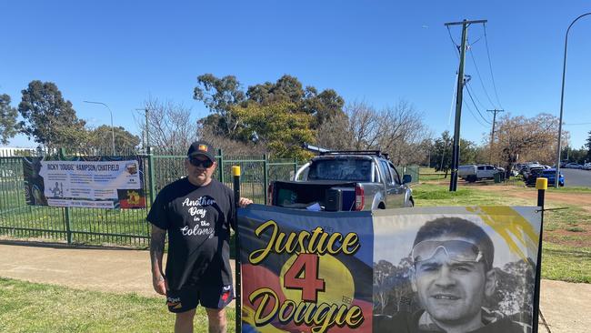 Ricky Hampson raising awareness in front of Dubbo Base Hospital two years after his son died after a misdiagnosis. Photo: Tijana Birdjan