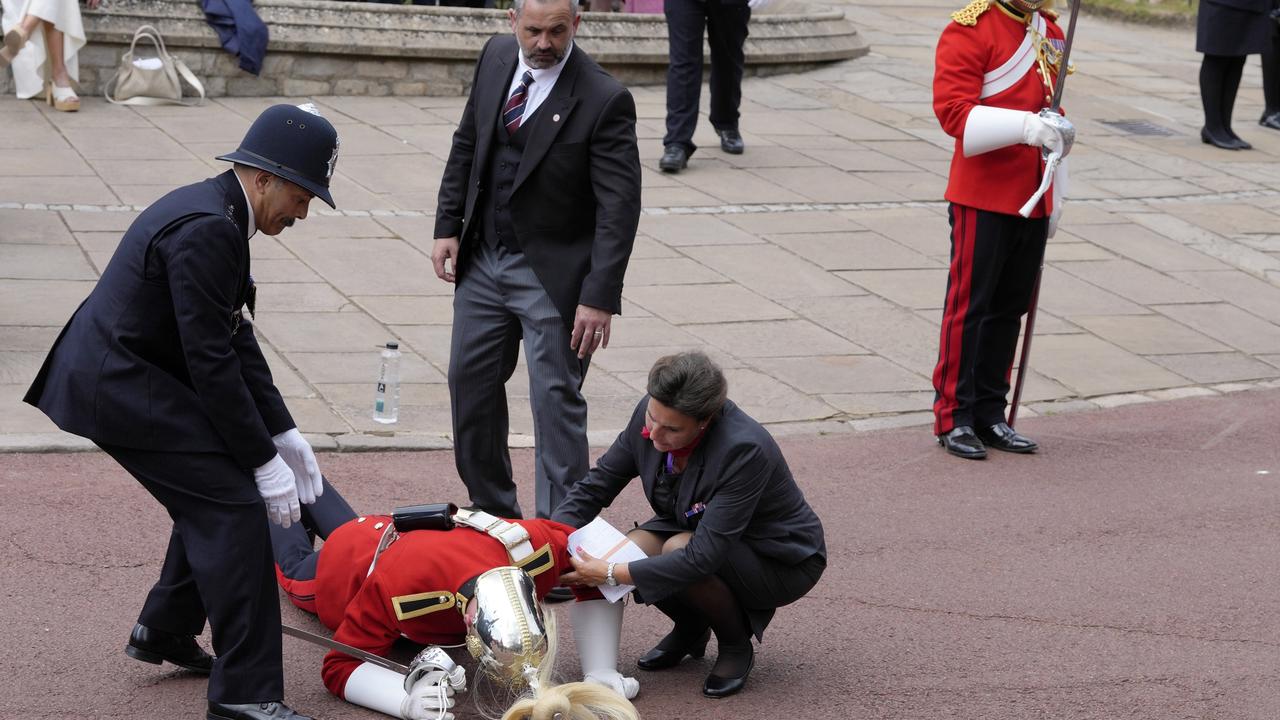 He was helped to his feet by officials nearby. Picture: Kirsty Wigglesworth-WPA Pool/Getty Images