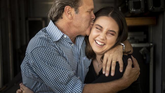 Troy with daughter Gem who is also a musician. Picture: Adam Hourigan.