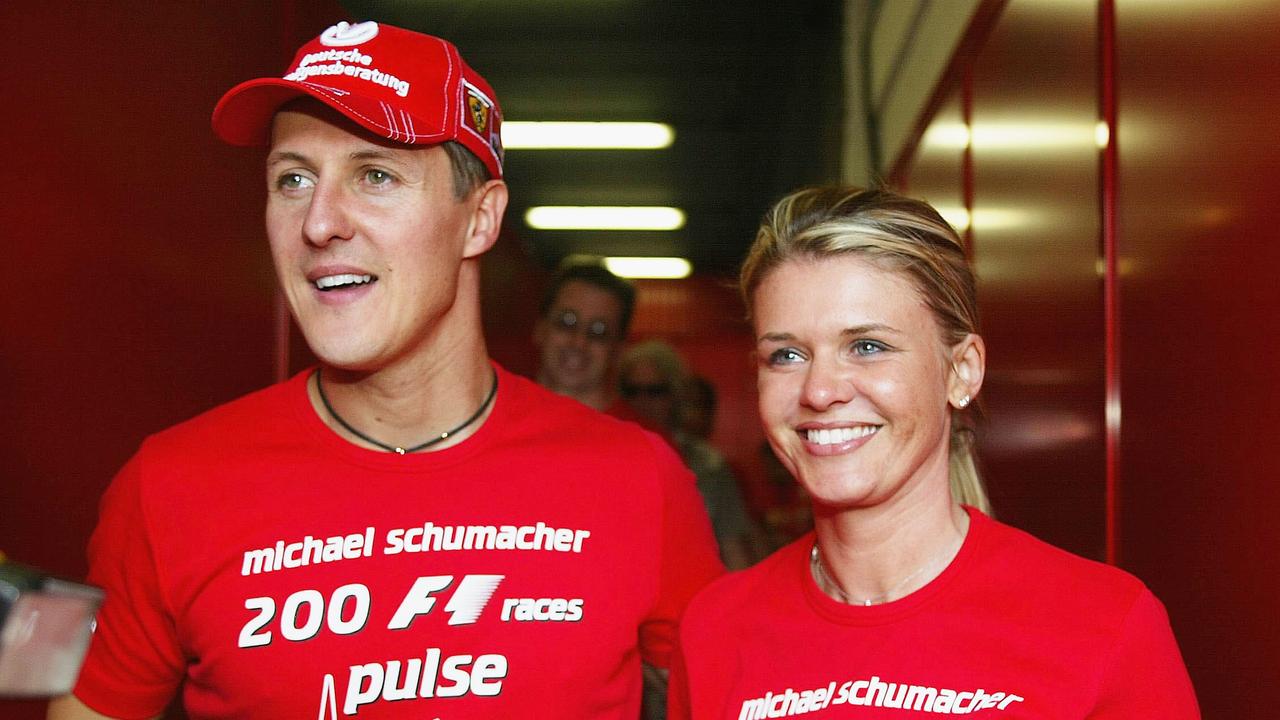 Michael Schumacher of Germany and Ferrari celebrates with his wife Corinna after competing in his 200th Grand Prix during the Spanish F1 Grand Prix on May 9, 2004, at the Circuit de Catalunya in Barcelona, Spain. (Photo by Getty Images)