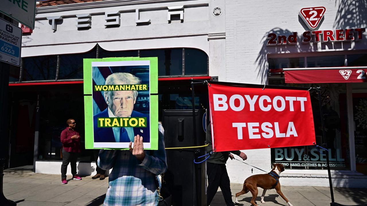 <!DOCTYPE html PUBLIC "-//W3C//DTD HTML 4.0 Transitional//EN" "http://www.w3.org/TR/REC-html40/loose.dtd"><html><body><p>People are seen participating in a &acirc;&#128;&#152;Tesla Takedown&acirc;&#128;&#153; protest in Pasadena, California. Picture: Frederic J. Brown/AFP</p></body></html>