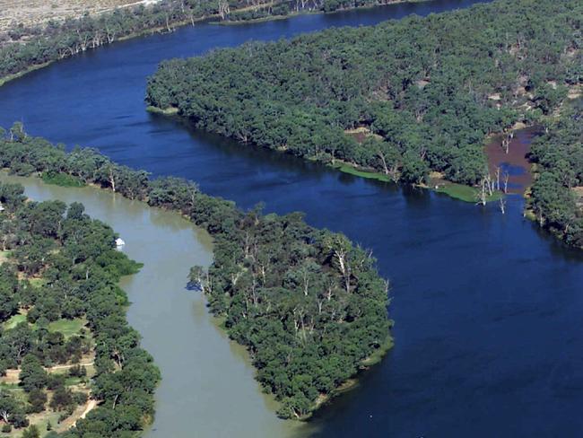 Aerial picture of the convergence of the muddy Darling River (L) and the Murray River (R) at Wentworth, NSW. In the forground is the lock and the weir.