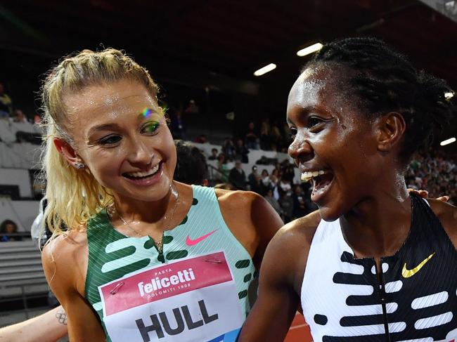 FLORENCE, ITALY - JUNE 02: Faith Kipyegon of Team Kenya interacts with Jessica Hull of Team Australia and Ciara Mageean of Team Ireland after victory in the Women's 1500m during the Golden Gala Pietro Mennea, part of the Diamond League series at Rodolfi Stadium on June 02, 2023 in Florence, Italy. (Photo by Valerio Pennicino/Getty Images)