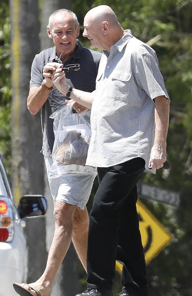 A relieved-looking Chris Dawson (left) walks out of Silverwater jail today accompanied by his brother Peter. Picture: Chris Pavlich/The Australian