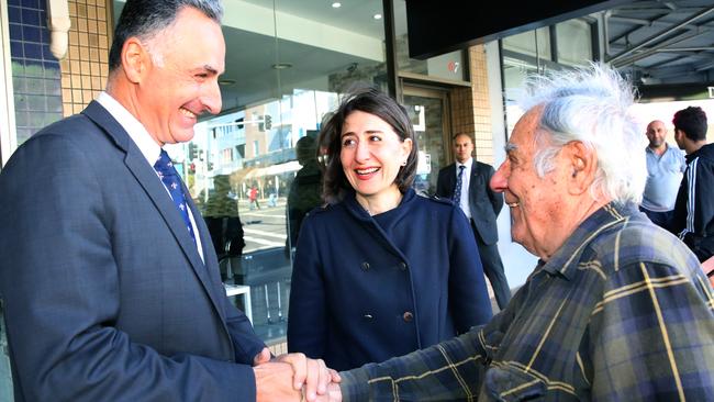 MP for Drummoyne John Sidoti shakes hands with local Flavian Bottan as NSW Premier Gladys Berejiklian visited Concord. Photo: Angelo Velardo.