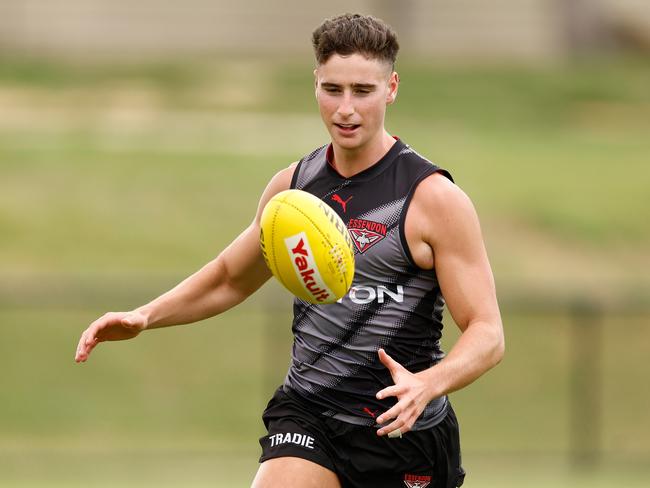 MELBOURNE, AUSTRALIA - JANUARY 16: Elijah Tsatas of the Bombers in action during the Essendon Bombers AFL training session at The Hangar on January 16, 2025 in Melbourne, Australia. (Photo by Michael Willson/AFL Photos via Getty Images)