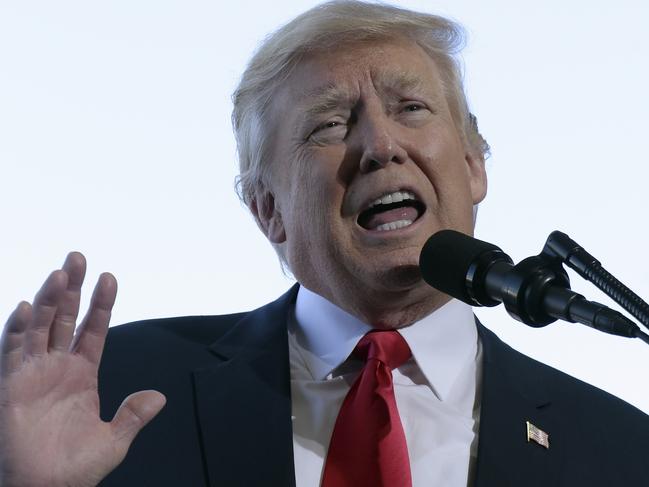 In this Feb. 17, 2017 photo, President Donald Trump speaks while visiting the Boeing South Carolina facility in North Charleston, S.C. As President Trump begins his second month in office, his team is trying to move past the crush of controversies that overtook his first month and make progress on health care and tax overhauls long sought by Republicans. (AP Photo/Susan Walsh)