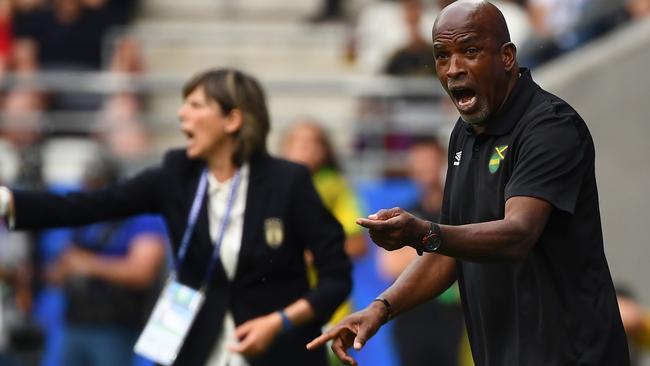 Jamaica coach Hue Menzies tries to get the message across to his players.