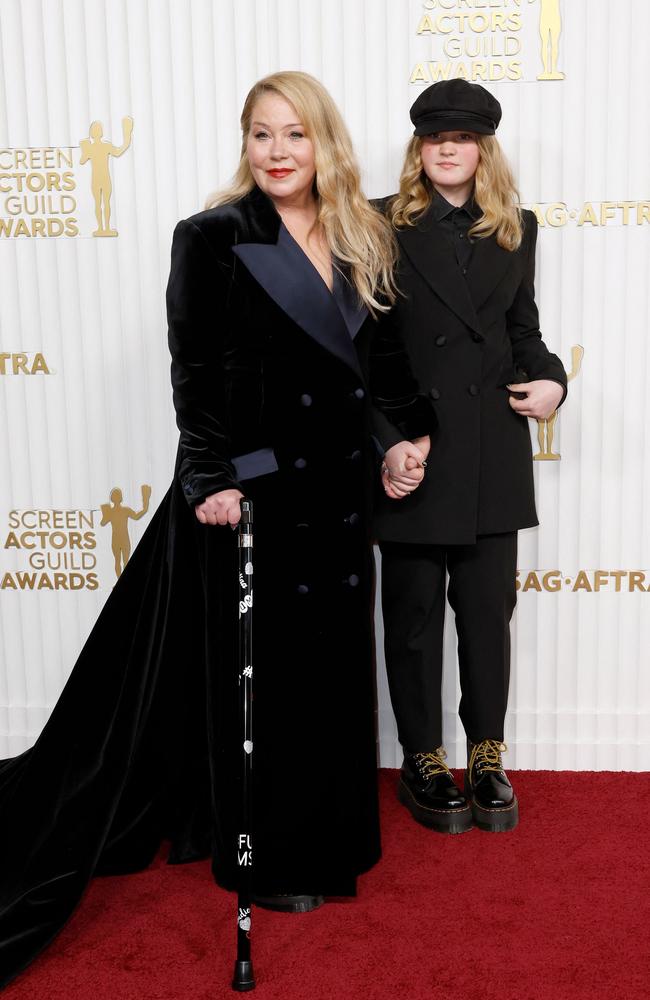 Applegate, seen here with daughter Sadie Grace at the SAG Awards last month, uses a walking stick with the words “FU MS” on it. Picture: Frazer Harrison/Getty Images/AFP