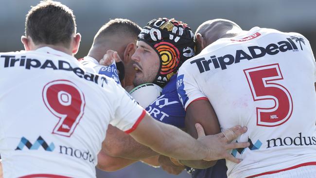 Josh Curran of the Warriors is tackled during the round six NRL match between the St George Illawarra Dragons and the New Zealand Warriors (Photo by Jason McCawley/Getty Images)