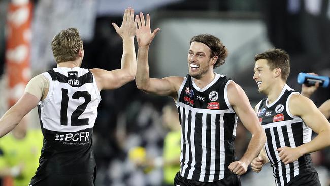 Jarrod Lienert celebrates a goal with Trent McKenzie. Picture: SARAH REED