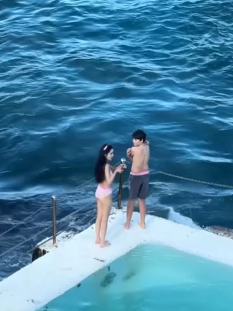 A woman at Bondi Icebergs asked a man to move out of the way so she could get a photo. Picture: Instagram/InfluencersInTheWild