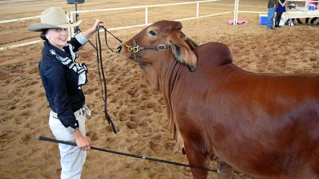 LIFE DOESN'T STOP: Tieri grazier Siobhan Randell, in the ring with Crinum Crest, is determined to bring home the Young Judges and Paraders national title despite suffering a brain tumour. Picture: Amber Hooker