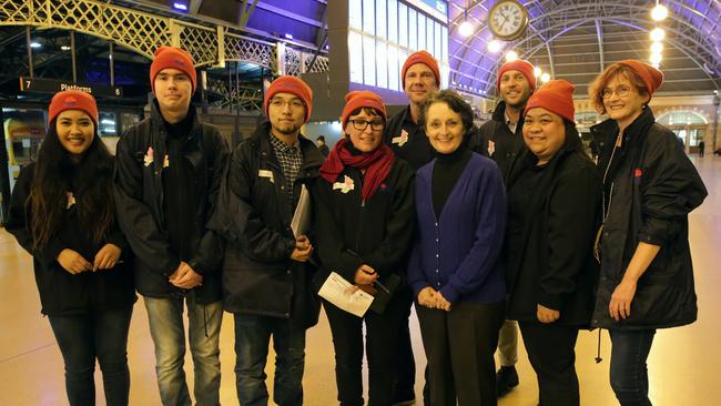 A FACS team join minister Pru Goward before meeting homeless people sleeping on trains.  Picture: Christian Gilles