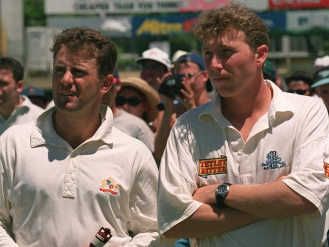 7 FEB 1995:  AUSTRALIA CAPTAIN MARK TAYLOR (LEFT) HAS A FIRM HOLD ON THE ASHES AS ENGLAND CAPTAIN MIKE ATHERTON LOOKS ON AFTER THE FINAL DAYS PLAY OF THE FIFTH TEST BETWEEN AUSTRALIA AND ENGLAND AT THE W.A.C.A. GROUND IN PERTH. Mandatory Credit: Ben Radfo