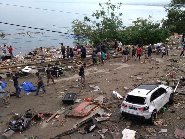 Death and disaster a day after a tsunami hit Palu, on Sulawesi island. Picture: AFP