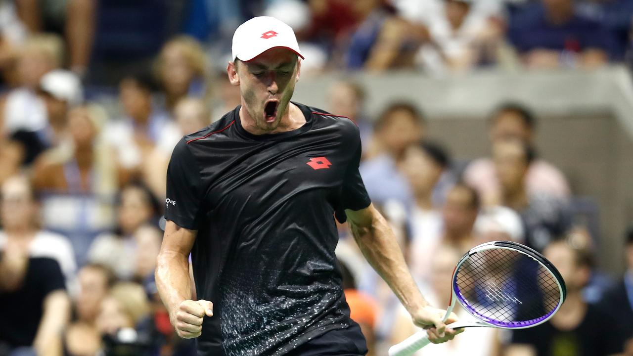 John Millman stunned Roger Federer to storm into the fourth round of the US Open.