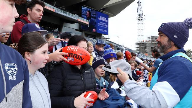 Chris Scott mingled with fans at an open training session on Tuesday. Picture: Alison Wynd