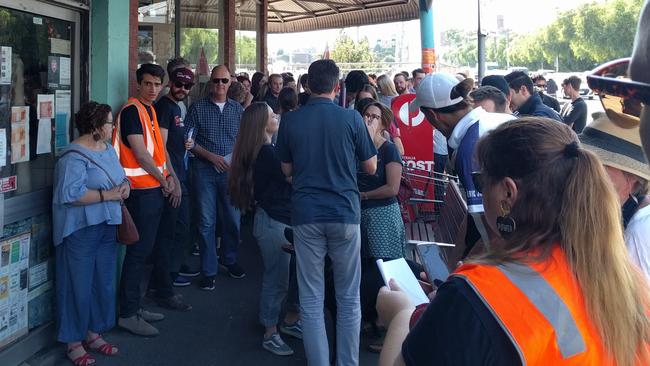 Workers, union members and supporters marched against the cafe in April last year.