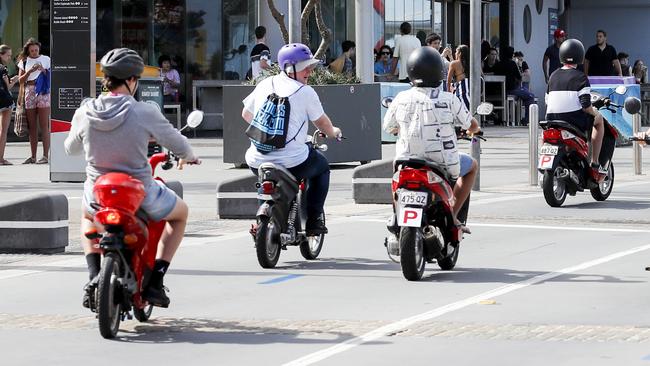 Schoolies riding scooters in Surfers Paradise. Picture: Tim Marsden