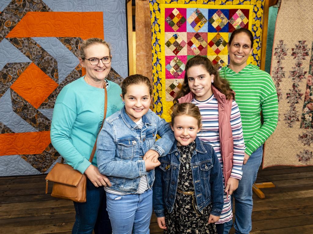 Checking out the Toowoomba Quilters Club exhibition are (from left) Brittany Ehrich, Ruby Ehrich, Addison Ehrich, Lucy Rodgers and Amanda Rodgers at Craft Alive at the Goods Shed, Sunday, May 22, 2022. Picture: Kevin Farmer