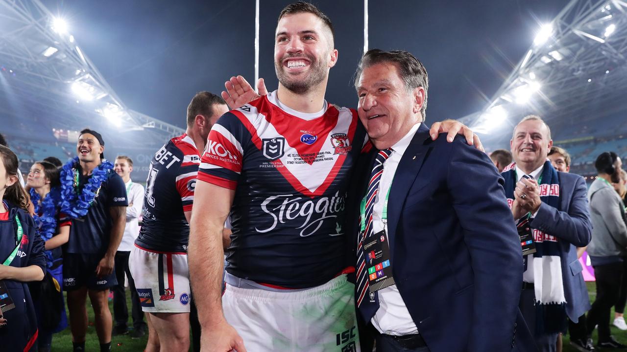 SYDNEY, AUSTRALIA – OCTOBER 06: Roosters Chairman Nick Politis celebrates with James Tedesco of the Roosters after the 2019 NRL Grand Final match between the Canberra Raiders and the Sydney Roosters at ANZ Stadium on October 06, 2019 in Sydney, Australia. (Photo by Matt King/Getty Images)
