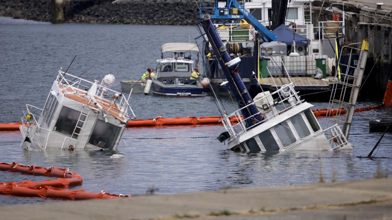 Sunken tug boats at Devonport wharf after being hit by cement carrier GOLIATH. Picture: Grant Viney