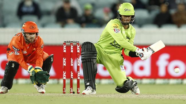 CANBERRA, AUSTRALIA - DECEMBER 22: First gamer Oliver Davies of the Thunder bats during the Big Bash League match between the Sydney Thunder and the Perth Scorchers at Manuka Oval, on December 22, 2020, in Canberra, Australia. (Photo by Darrian Traynor/Getty Images)