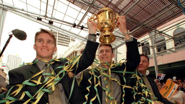 Wallaby superstars Tim Horan and Jason Little, with the 1999 Rugby World Cup, are just two of a long list of promising junior rugby league [players lost to the game. Picture: Nathan Richter