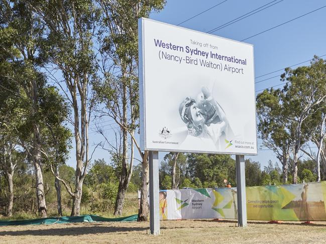 Signage with the airport’s official name.