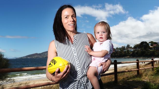 Trisha Squires, with daughter Holly, 14 months, will take over as AFL Tasmania CEO after the sudden departure of Rob Auld. Picture: NIKKI DAVIS-JONES