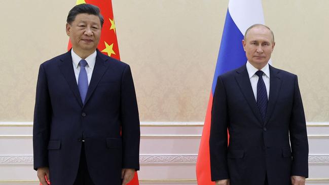 China's President Xi Jinping and Russian President Vladimir Putin during their trilateral meeting on the sidelines of the Shanghai Cooperation Organisation (SCO) leaders' summit in Samarkand.