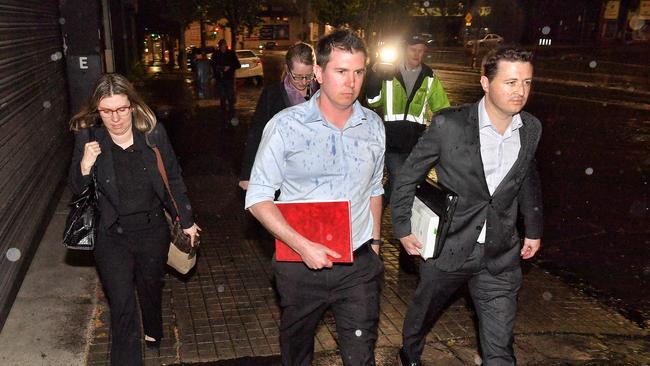 Registered Organisation Commission leaves the AWU offices on Spencer Street, Melbourne, after being raided by the AFP. Picture: Jason Edwards