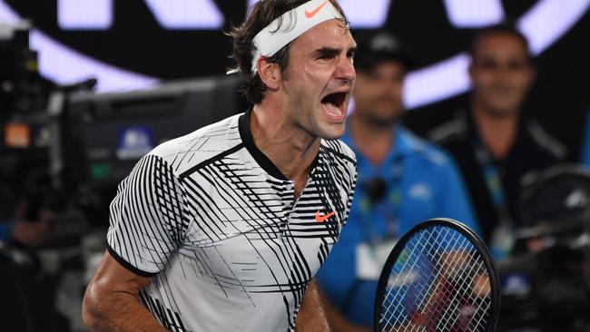 Roger Federer lets out a scream after his epic comeback against Rafael Nadal. Picture: AFP