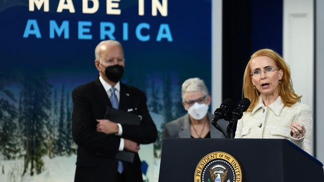 US President Joe Biden (L) and White House National Climate Advisor Gina McCarthy listen as Tritium CEO Jane Hunter (R) speaks during an event about rebuilding manufacturing in America. Picture: Brendan Smialowski / AFP