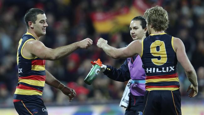 Adelaide’s Taylor Walker celebrates his goal with Rory Sloane. Picture: Sarah Reed