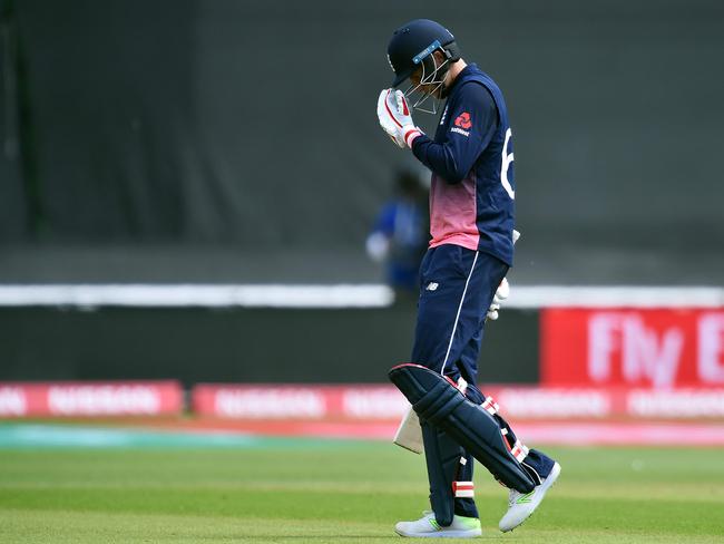 England's Joe Root walks back to the pavilion after losing his wicket for 46.